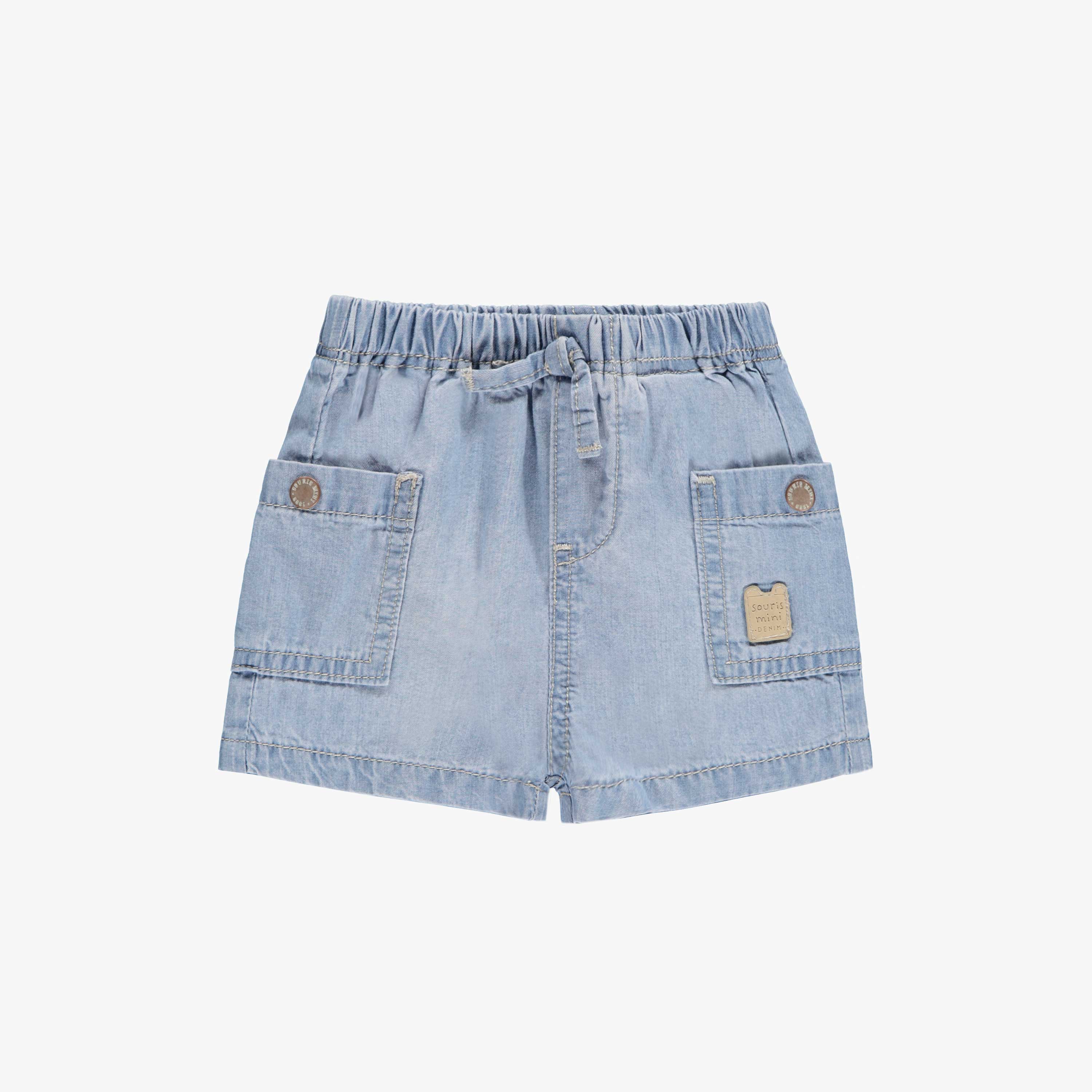 Short bleu en denim léger, naissance