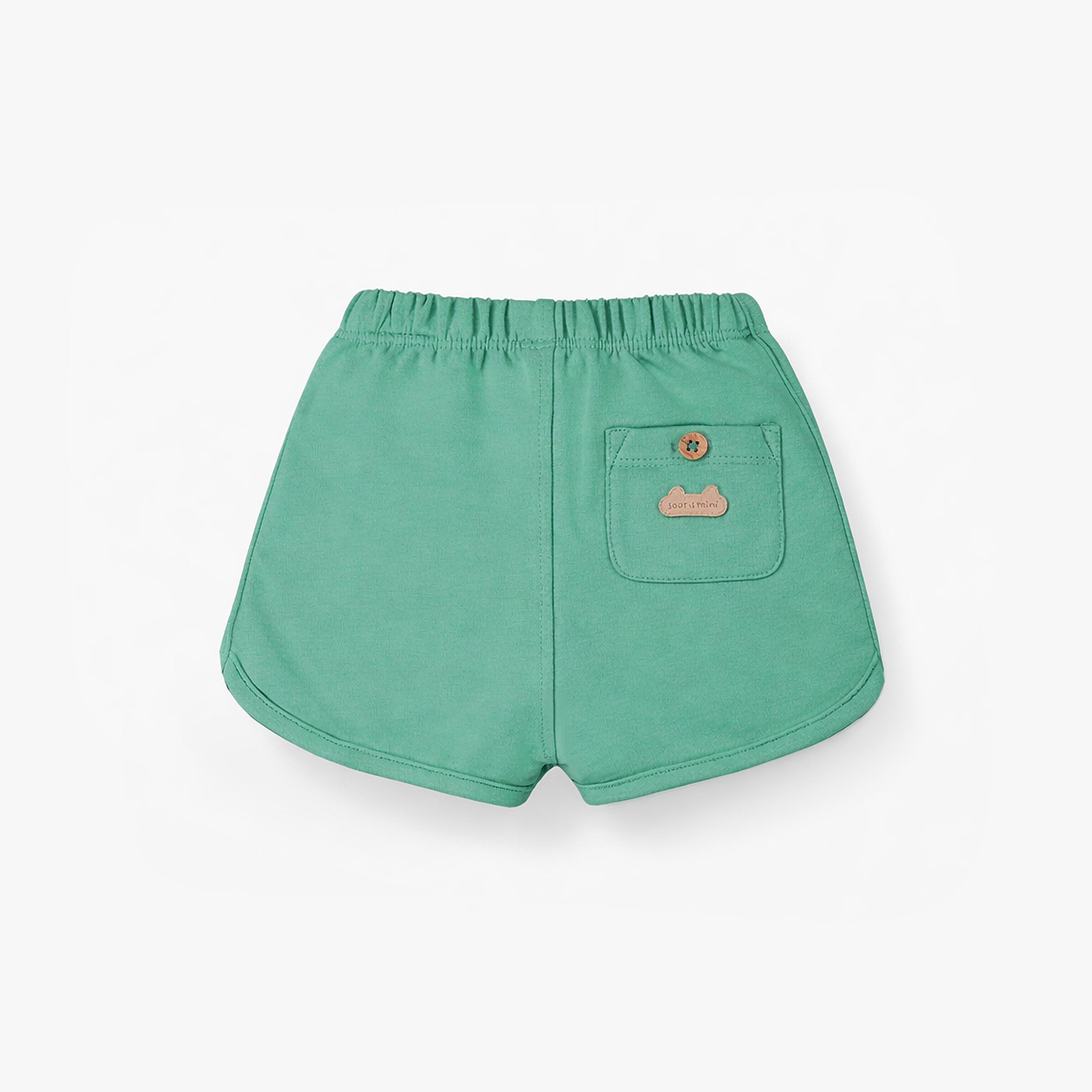 Short vert en coton français, naissance