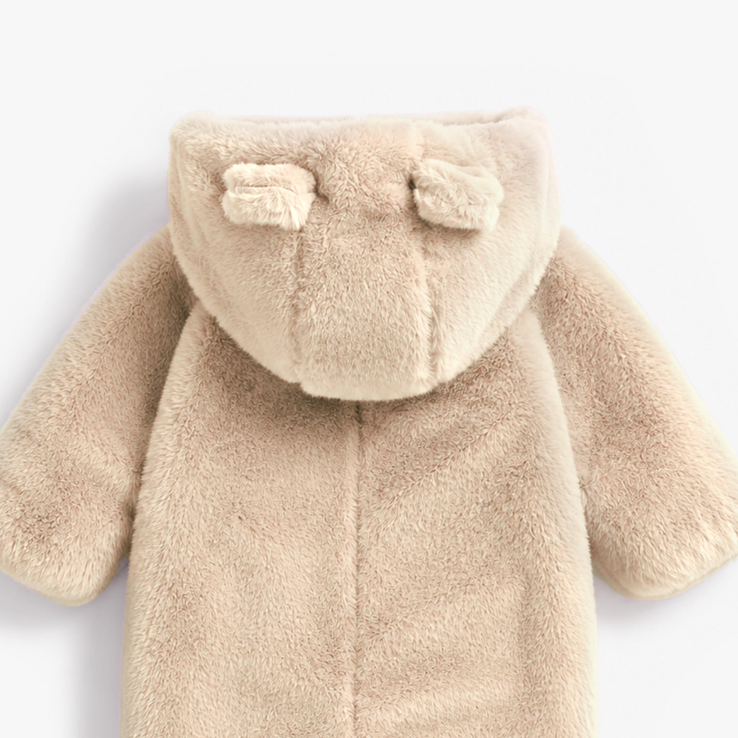 Beige faux fur one-piece, baby