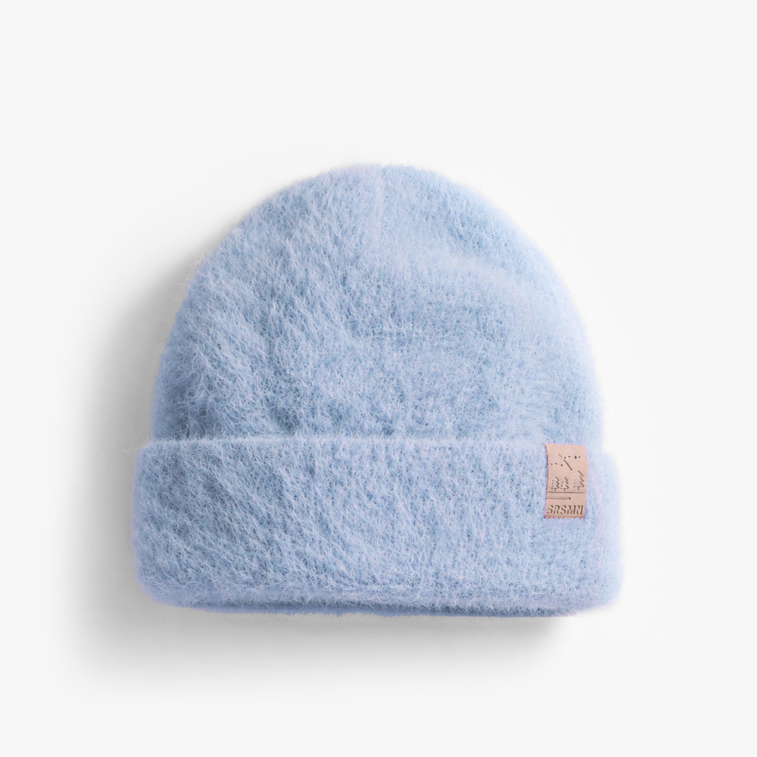 Tuque bleu pâle en tricot duveteux, enfant fille