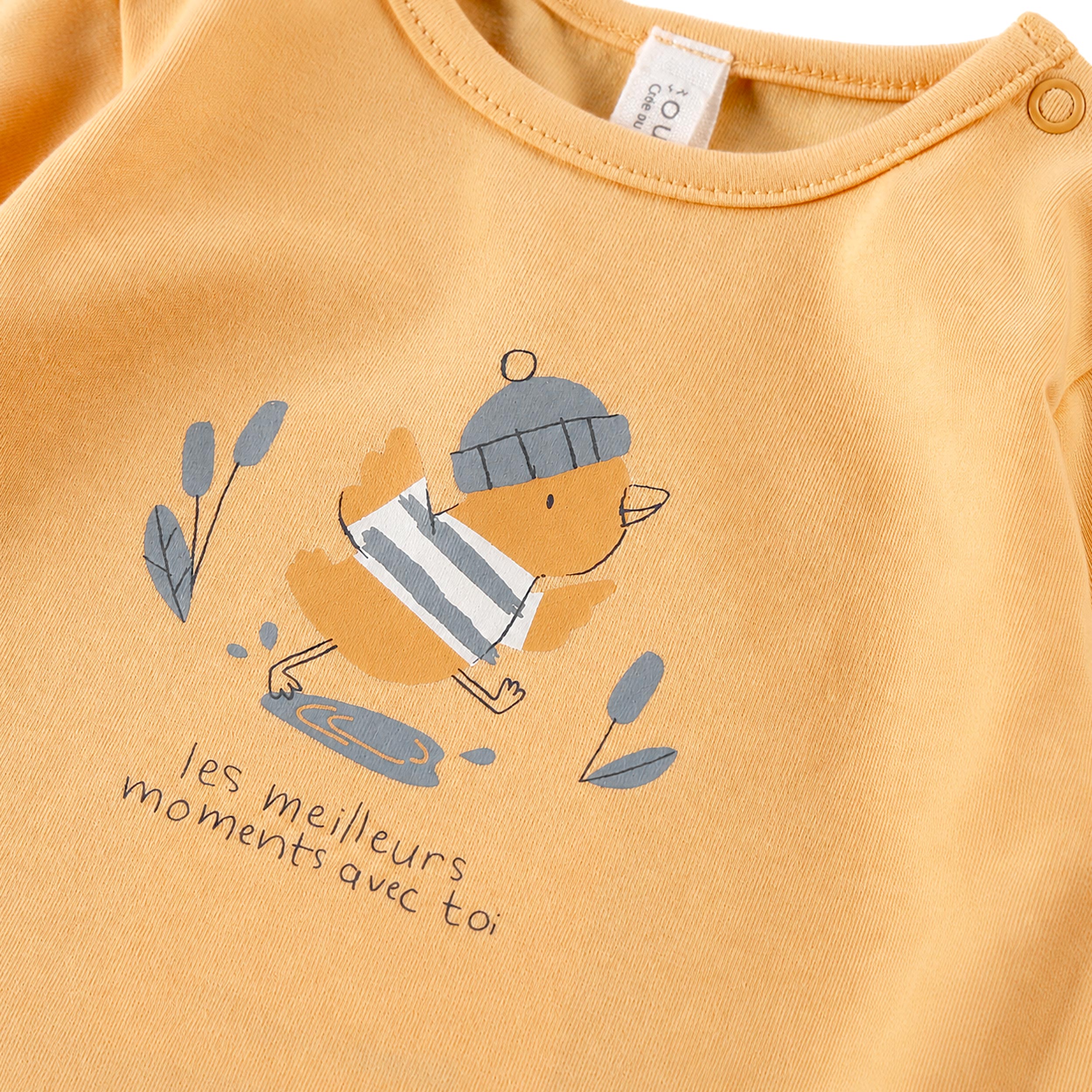T-shirt jaune avec illustration de canard, naissance