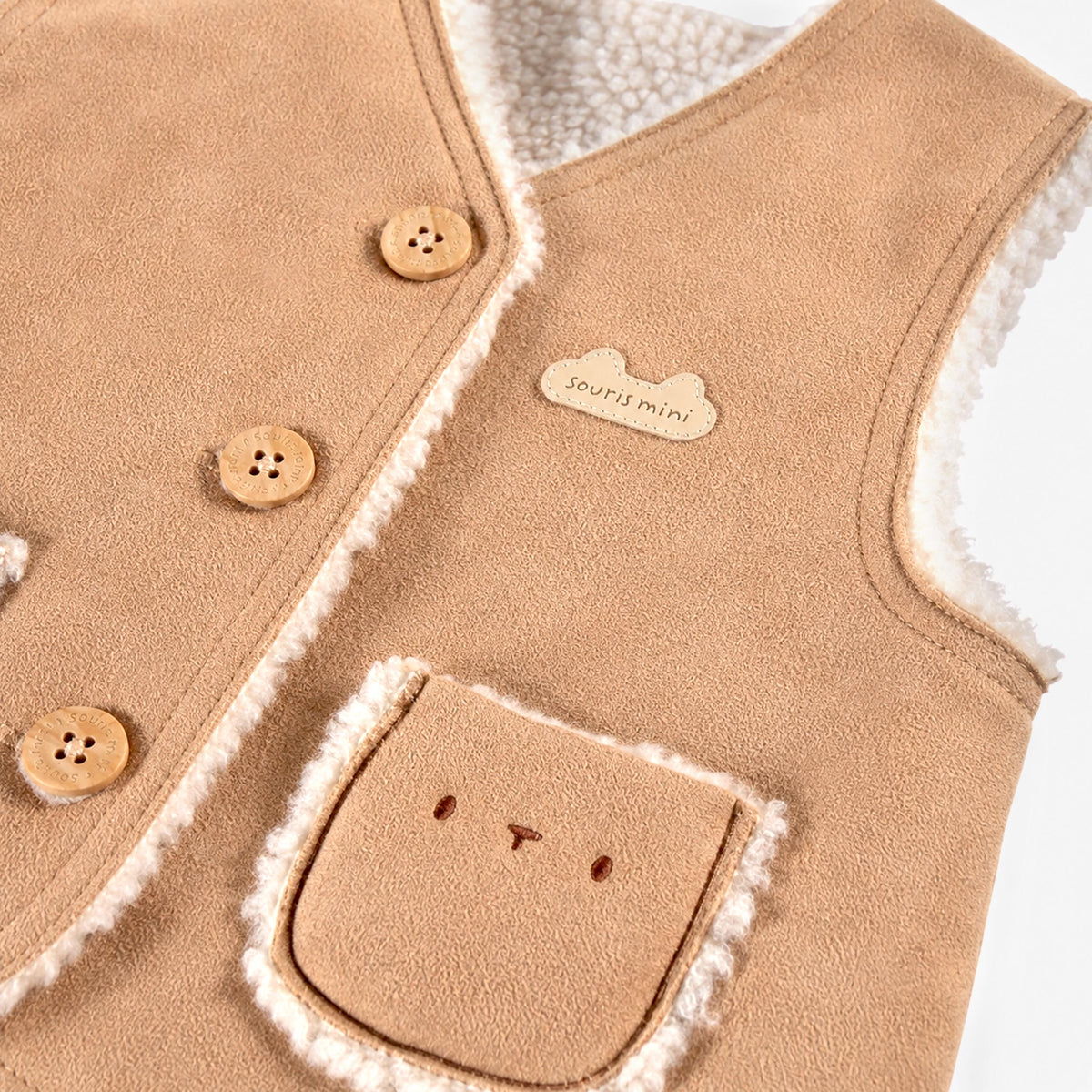Veste sans manches taupe en suède et sherpa, naissance
