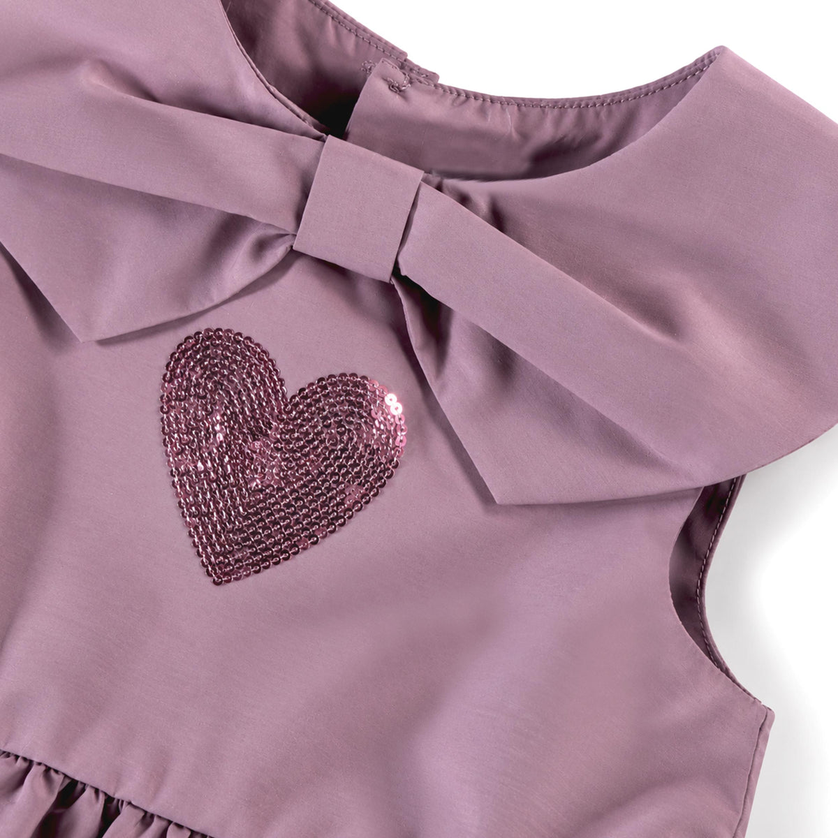 Pink dress with bow collar and sequin heart, child