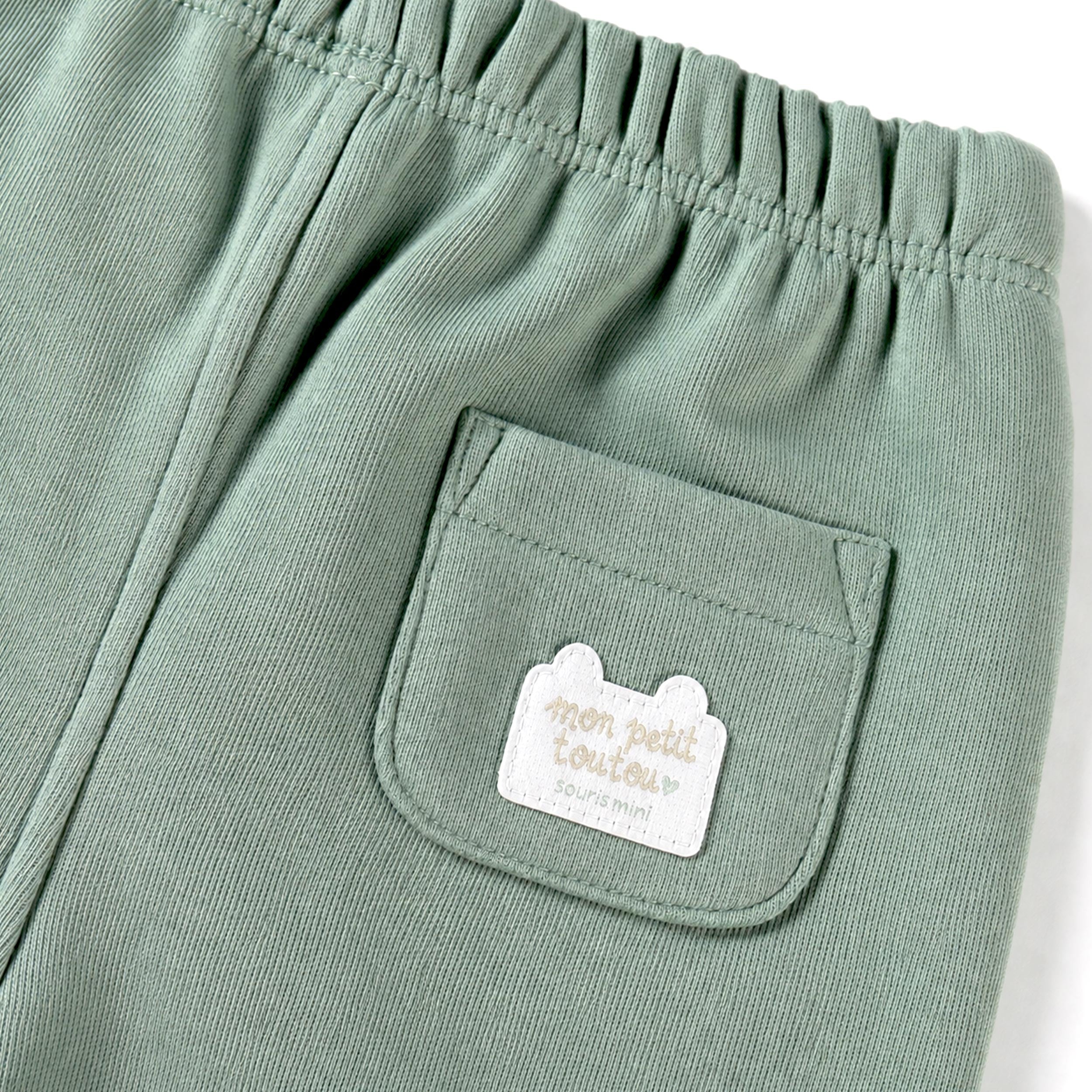 Green fleece pants, baby