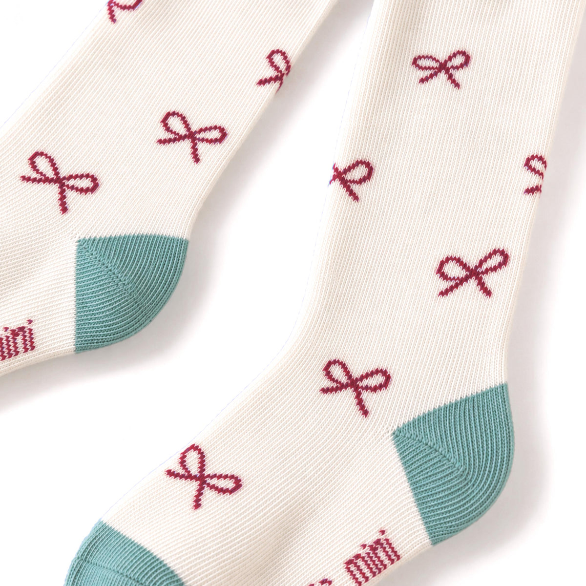 Cream tights with small bow print, baby