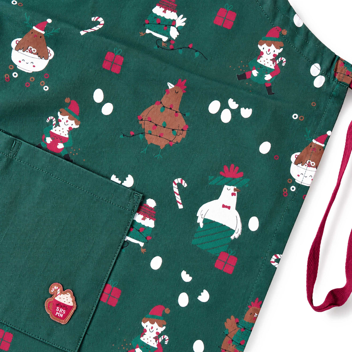 Green apron with holiday print, adult