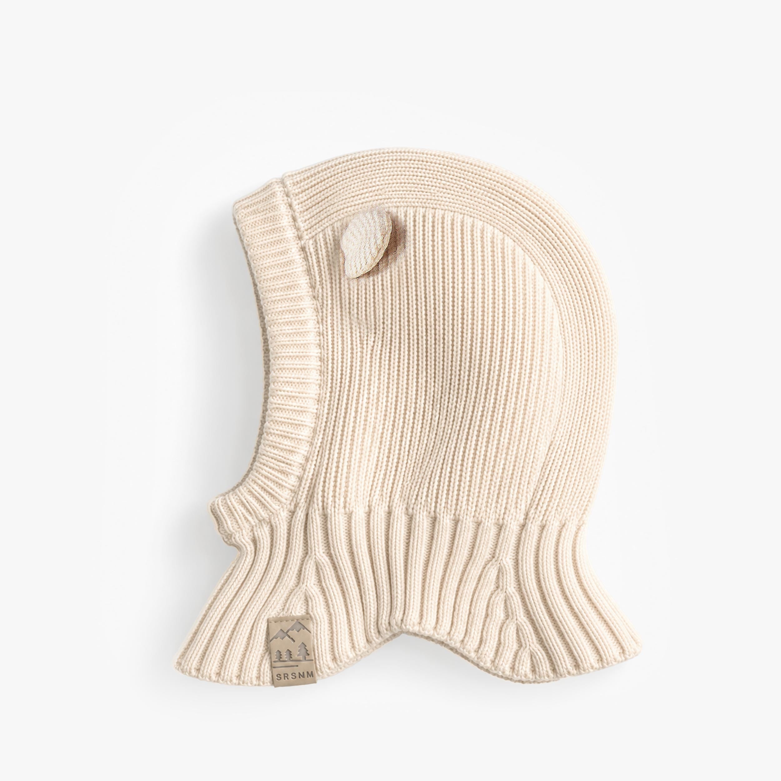 Cagoule crème en tricot avec oreilles, bébé
