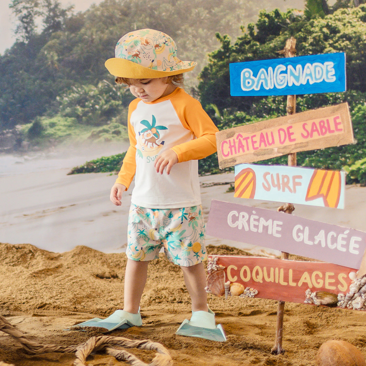 Bermuda de bain beige à motifs tropicaux, bébé