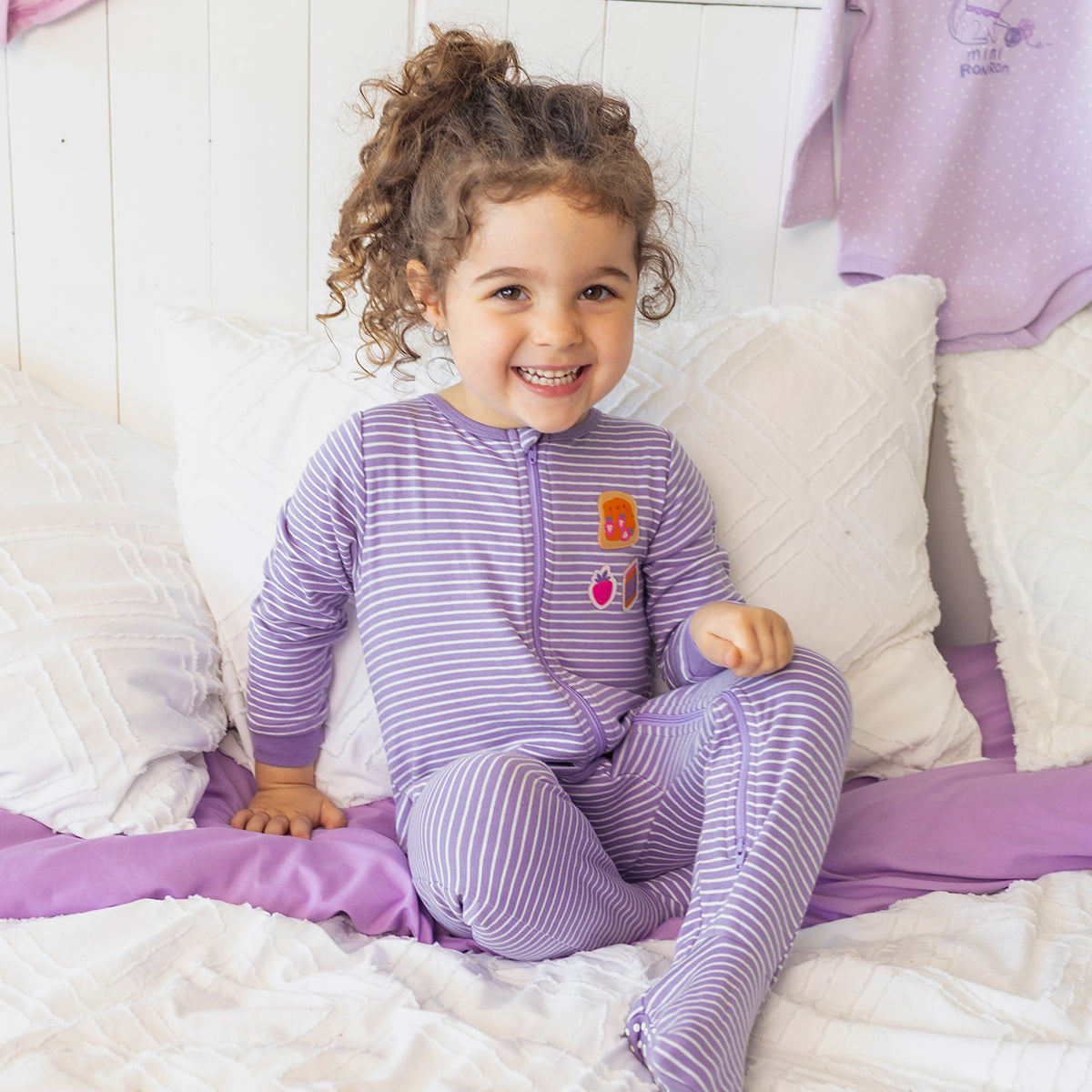 Purple striped one-piece pajamas, baby