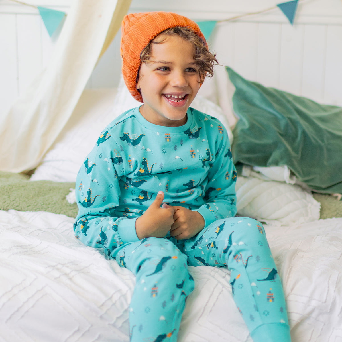 Turquoise two-piece pajamas with a dragon print, child