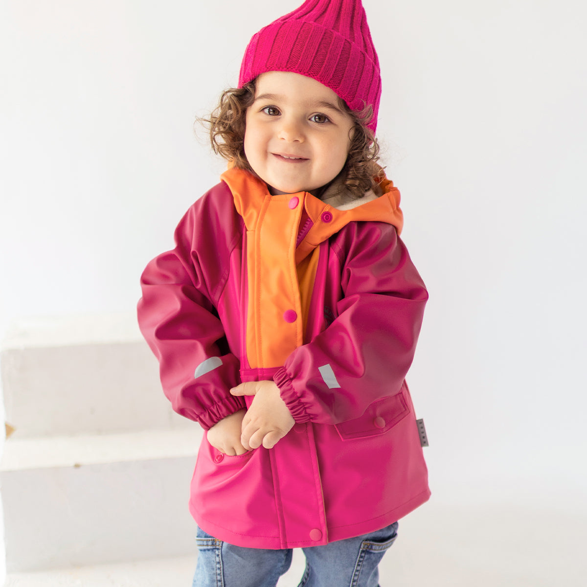 Manteau imperméable rose et orange, bébé