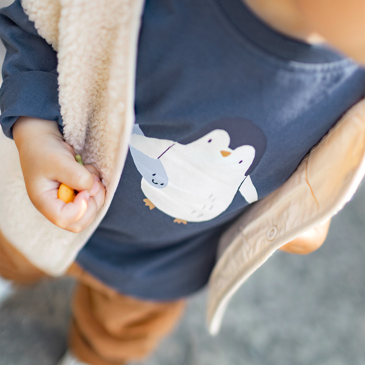 Blue T-shirt with a penguin design, baby