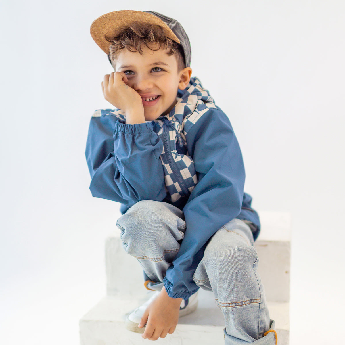 Manteau coupe-vent bleu à motif damier, enfant