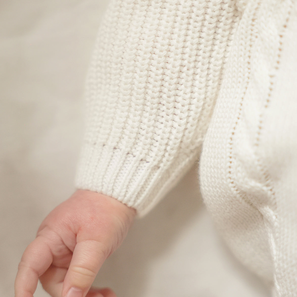 Cream knit sweater with watering can, newborn