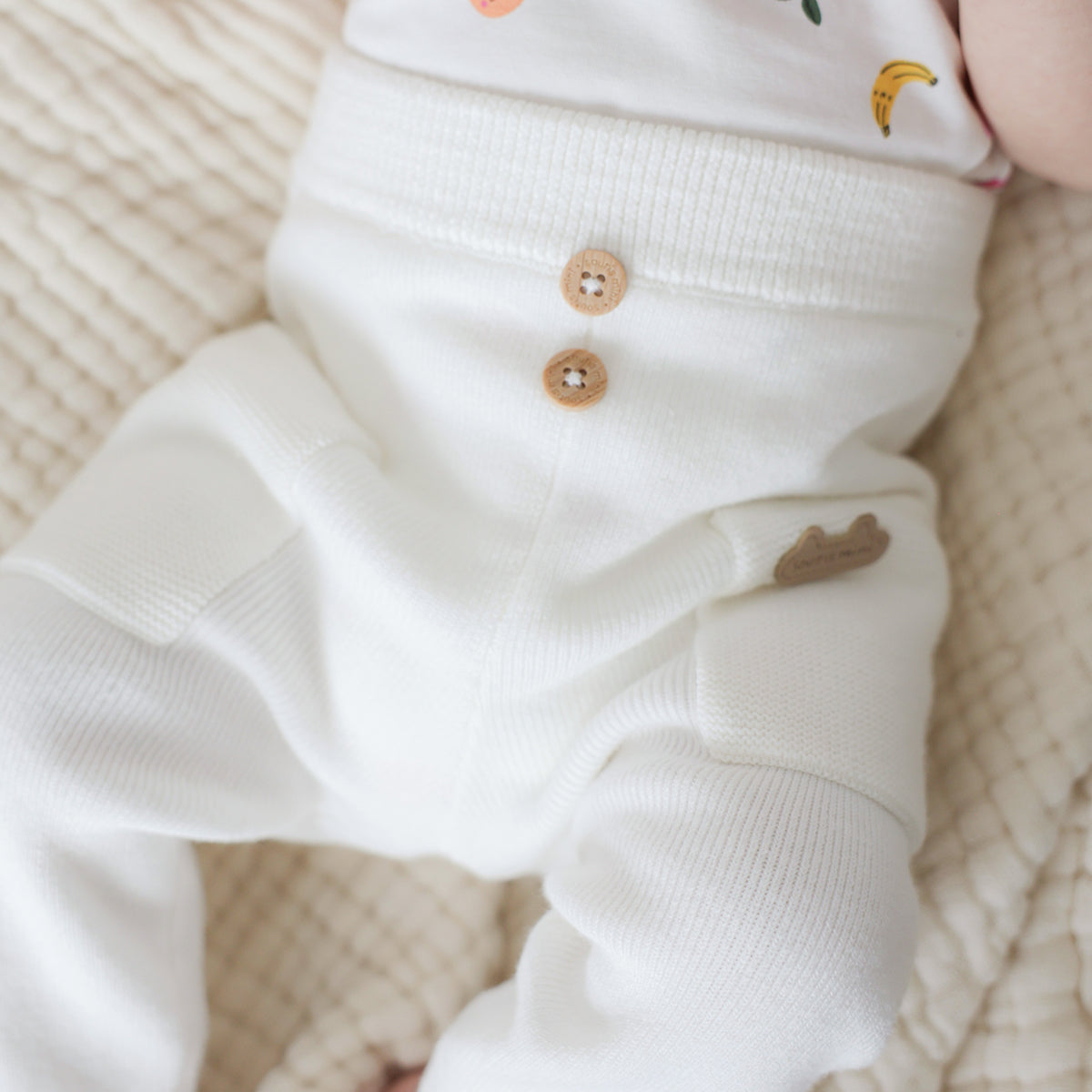 Pantalon crème en tricot, naissance
