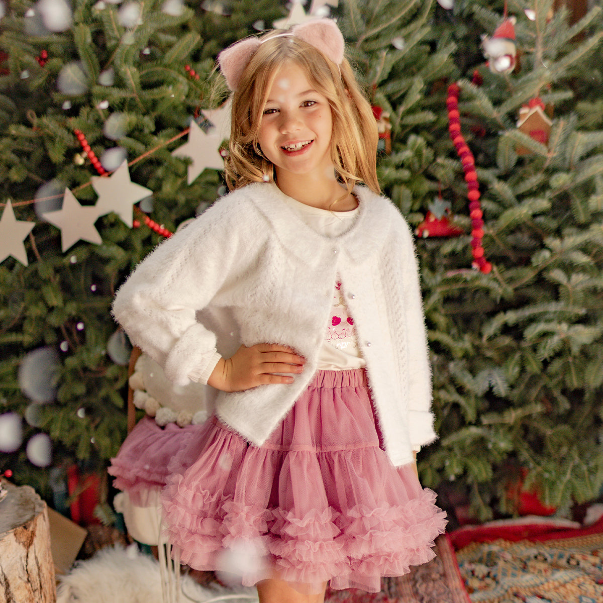 Photo d'un enfant portant la jupe rose en tulle souple, enfant