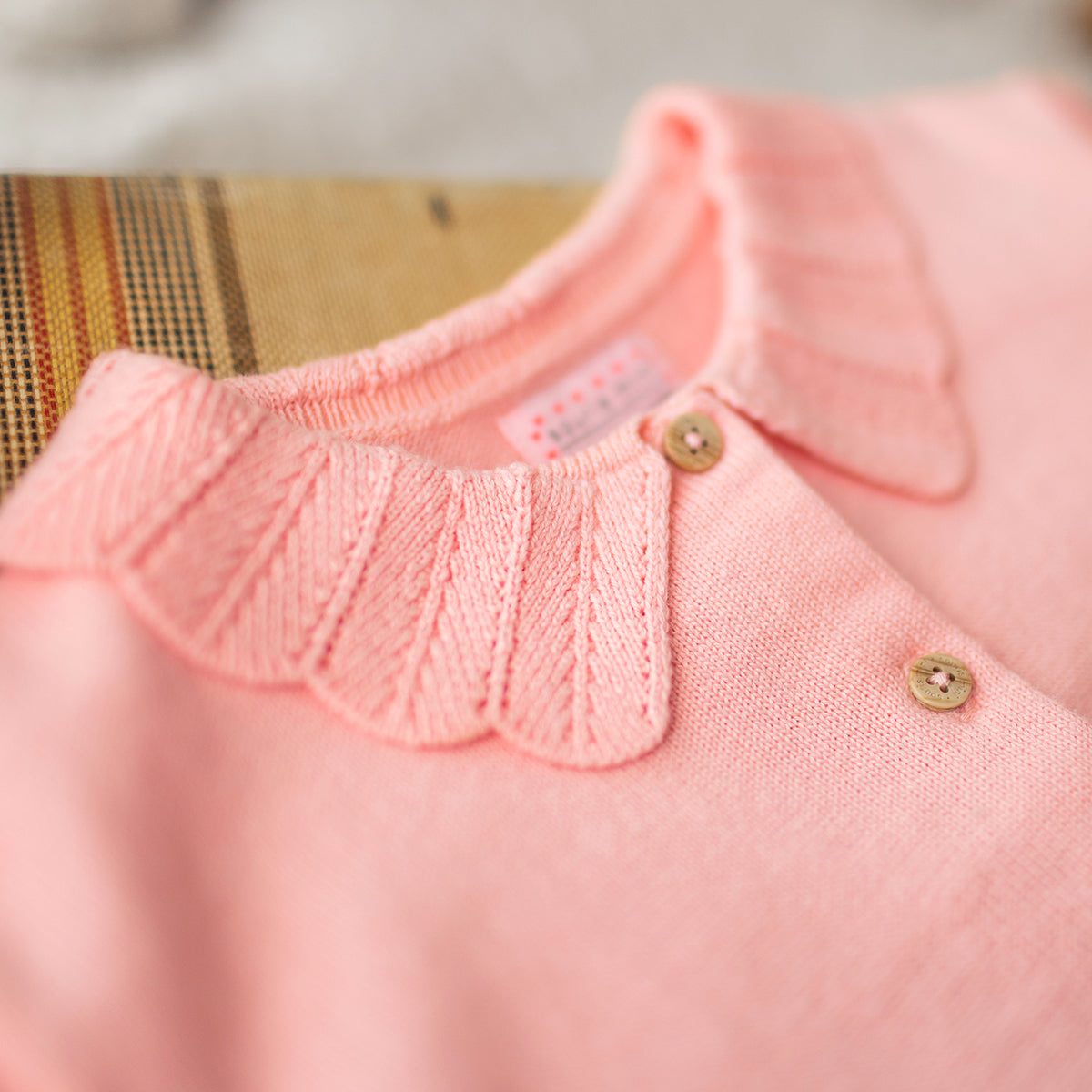 Pink knit cardigan, baby