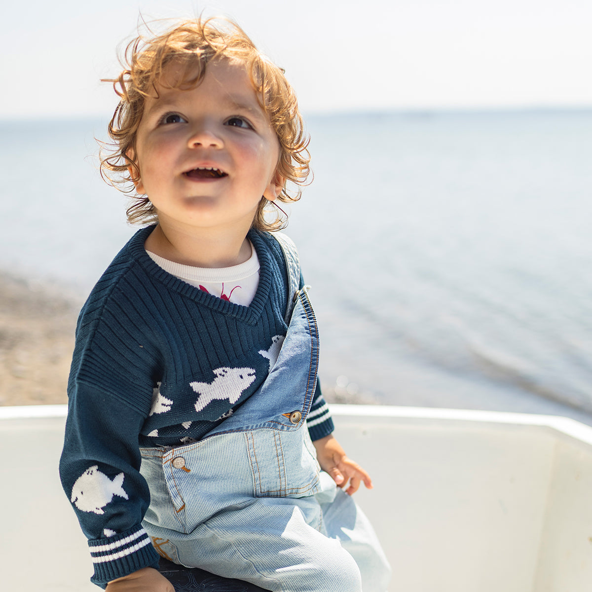 Blue knit sweater with fish, baby