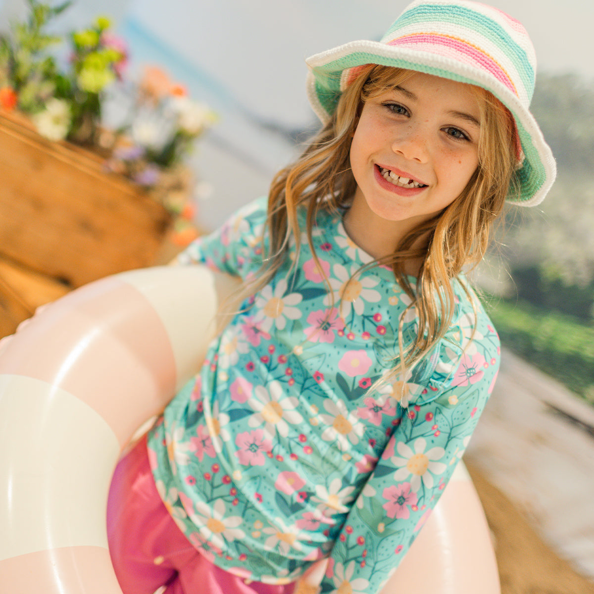 Turquoise rashguard with floral all over print, child