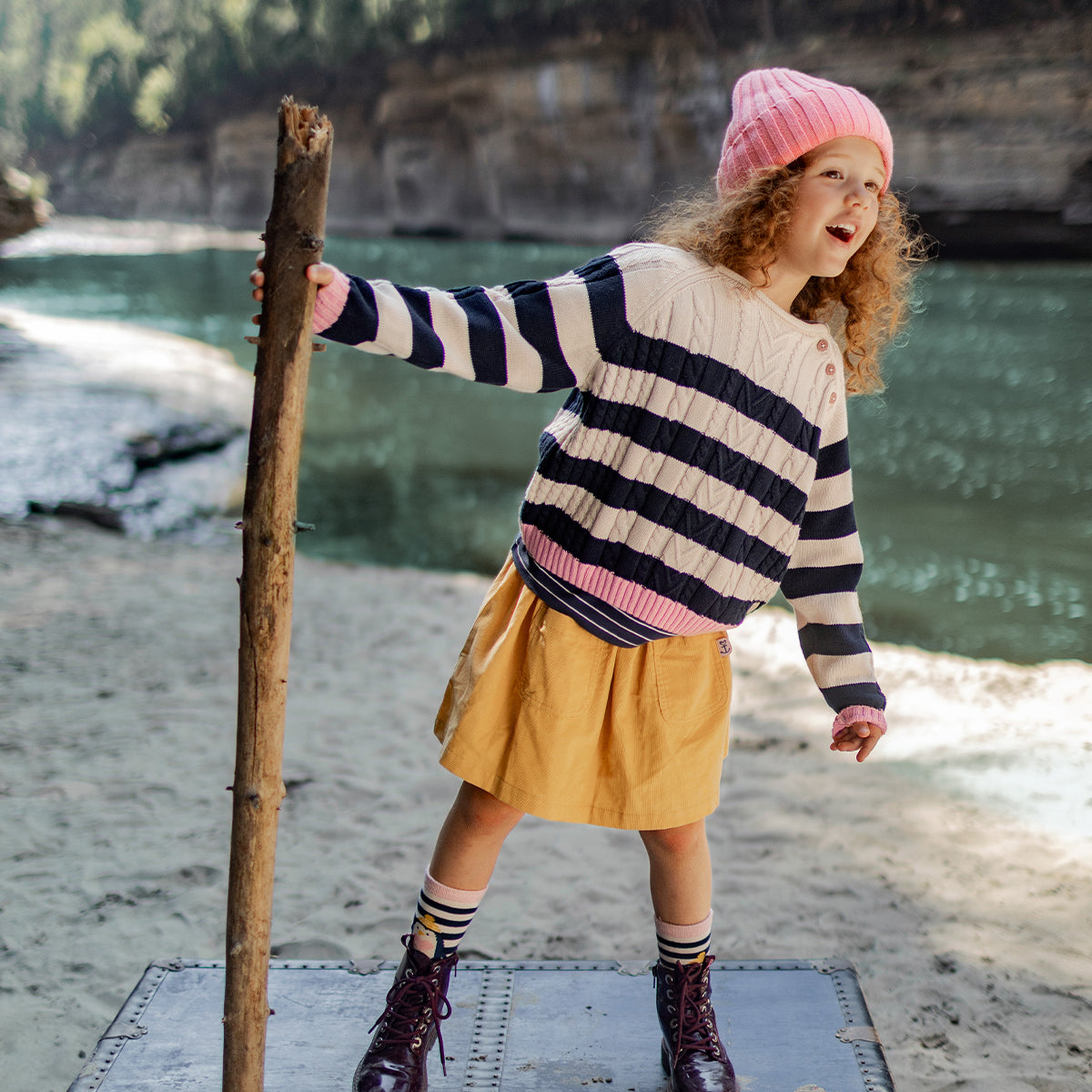 Cream and dark blue striped knit sweater, child