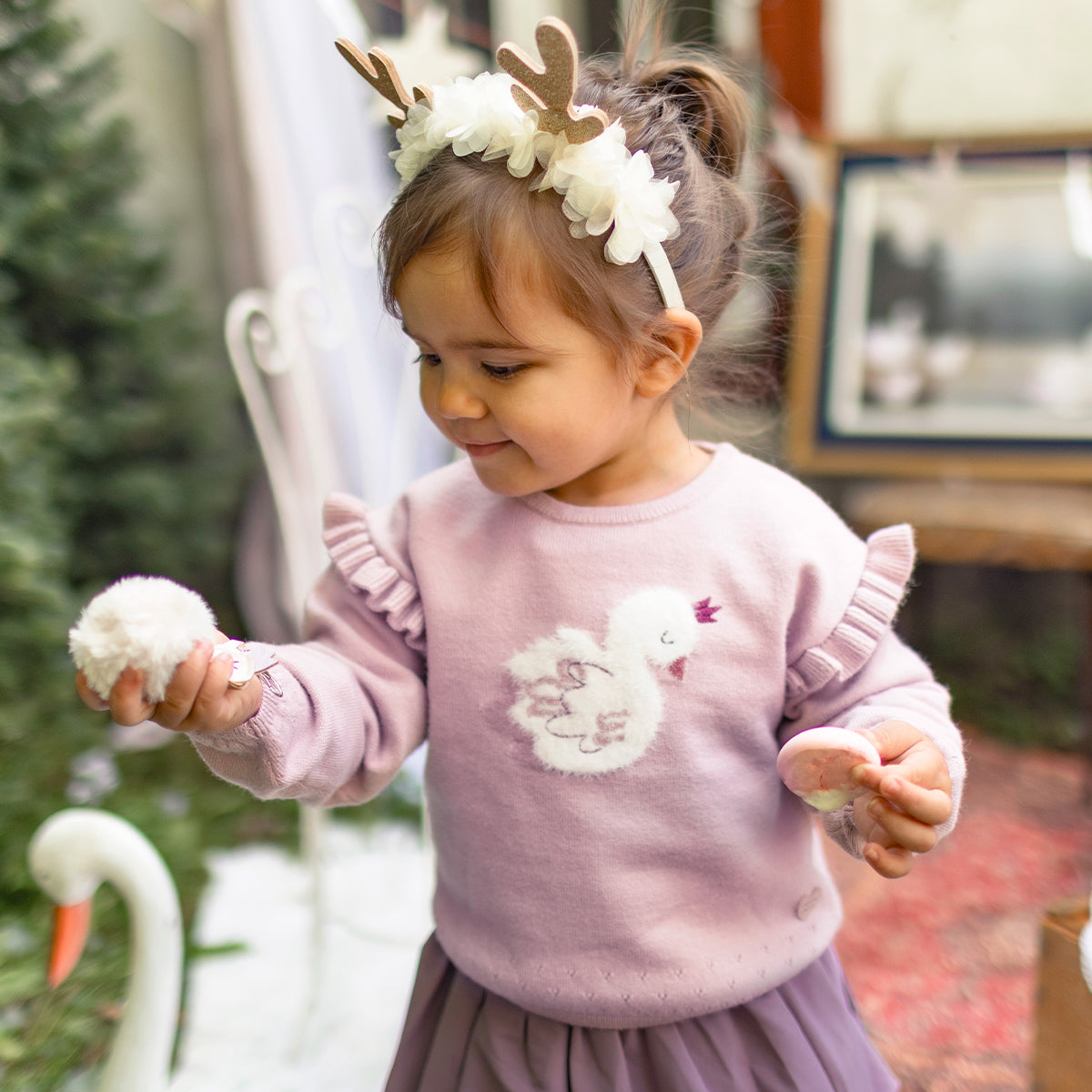 Pink knit sweater with swan illustration, baby