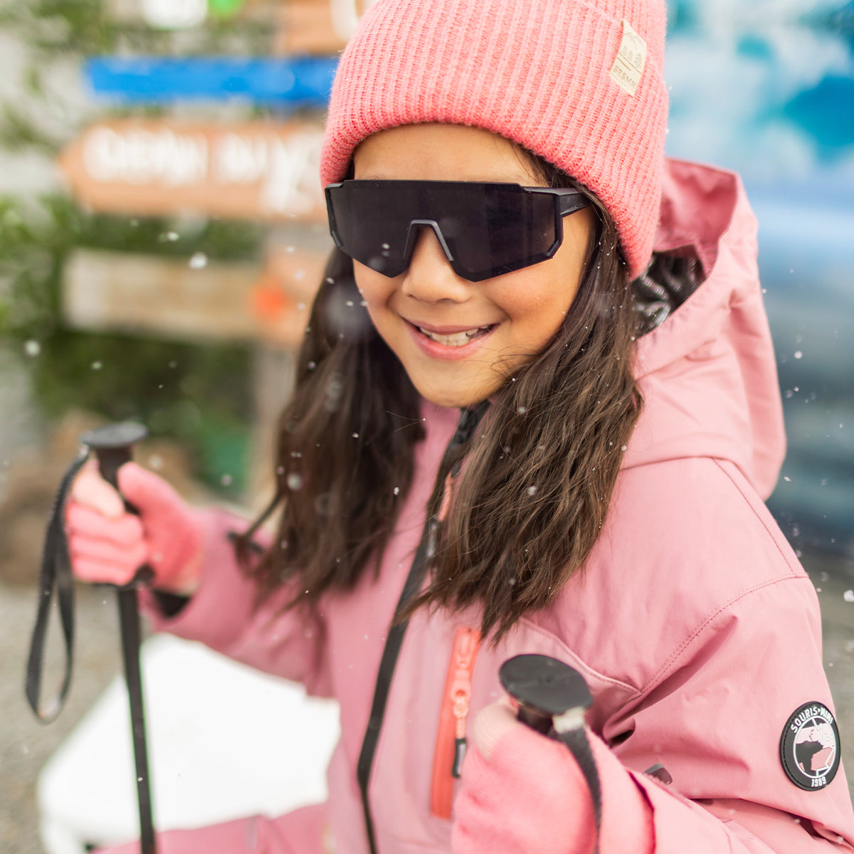 Photo d'un enfant portant l'habit de neige deux pièces PERFO+ rose, enfant