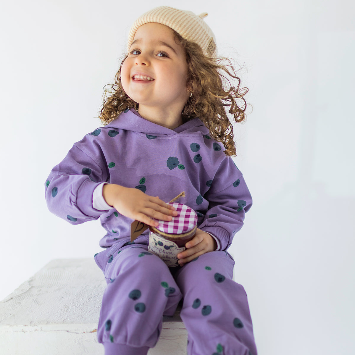 Purple pants with blueberry print, baby