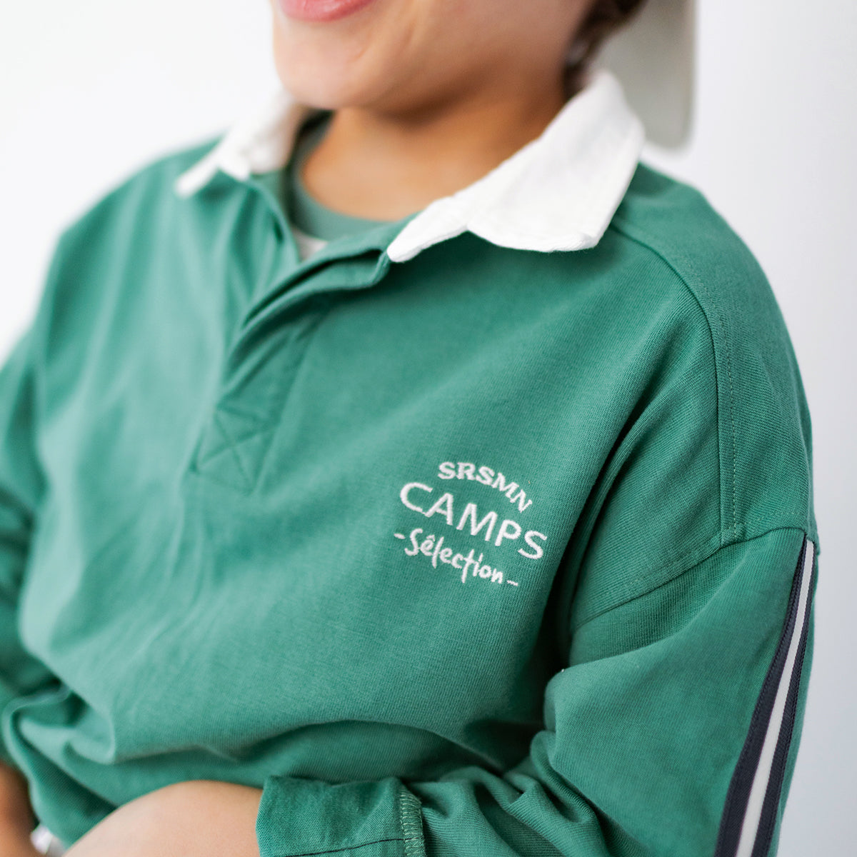 Green polo shirt, child