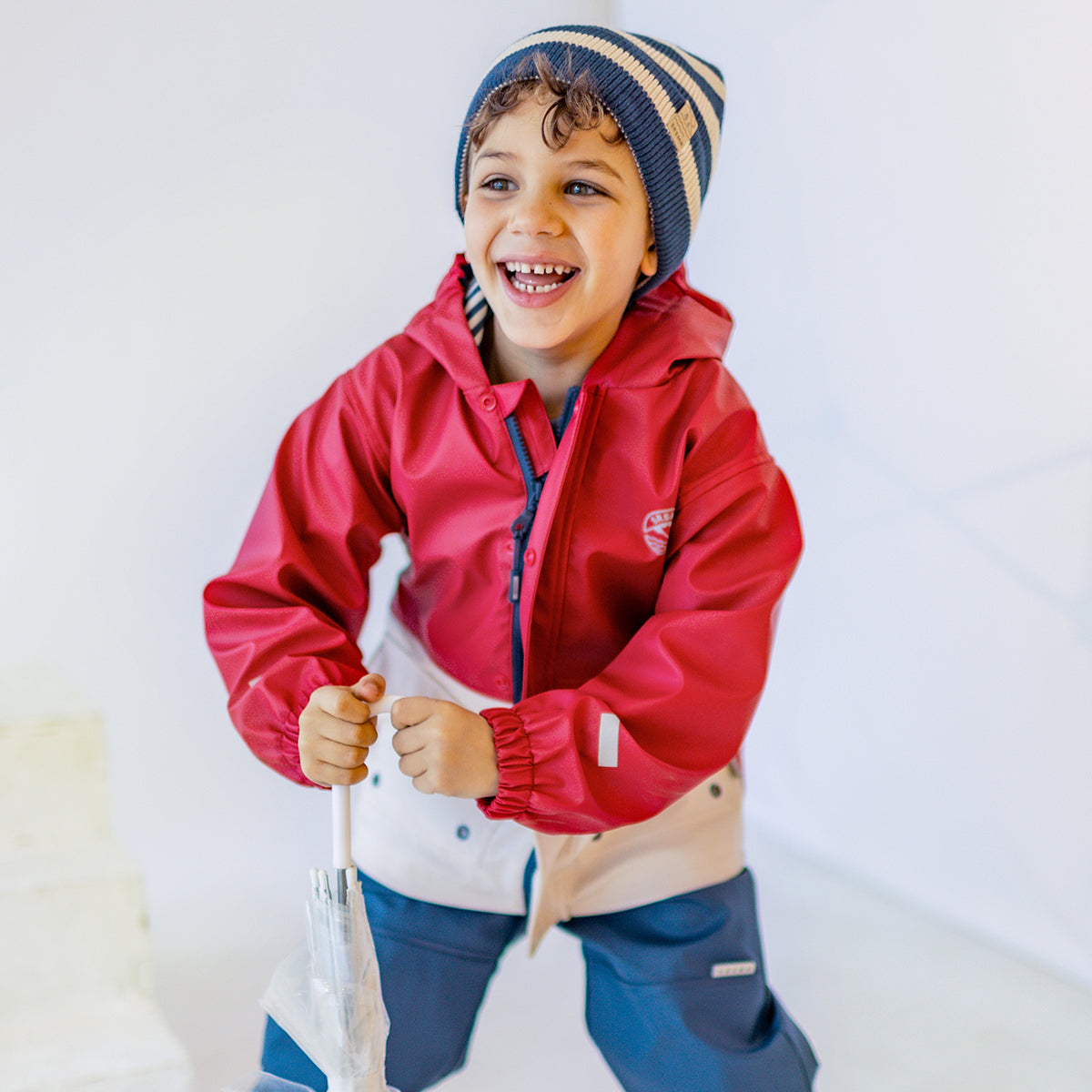 Manteau imperméable rouge et crème, enfant