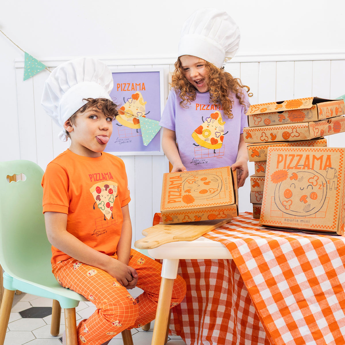 Two-piece purple pajamas with pizza patterns, child