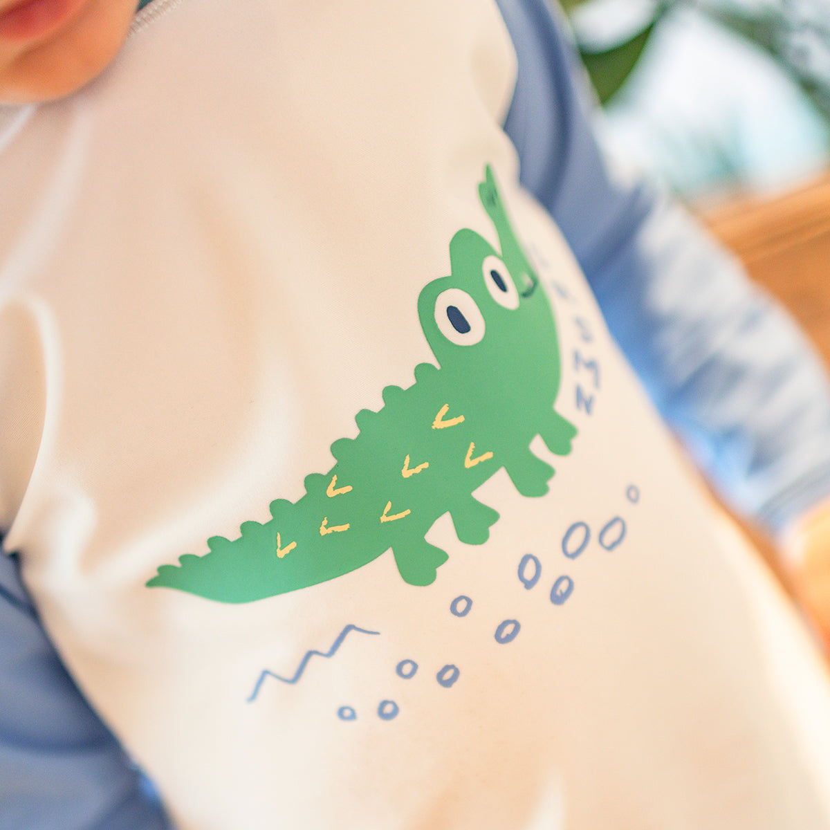Blue and cream rashguard with crocodile, baby
