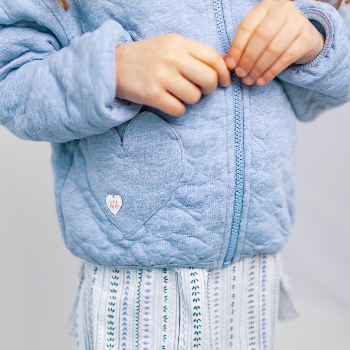 Blouson bleu avec matelassé de cœurs, enfant