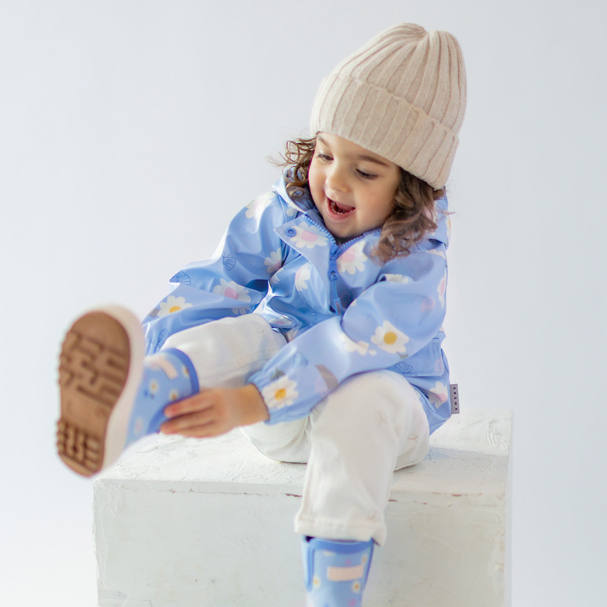 Light blue raincoat with flower and butterfly prints, baby 