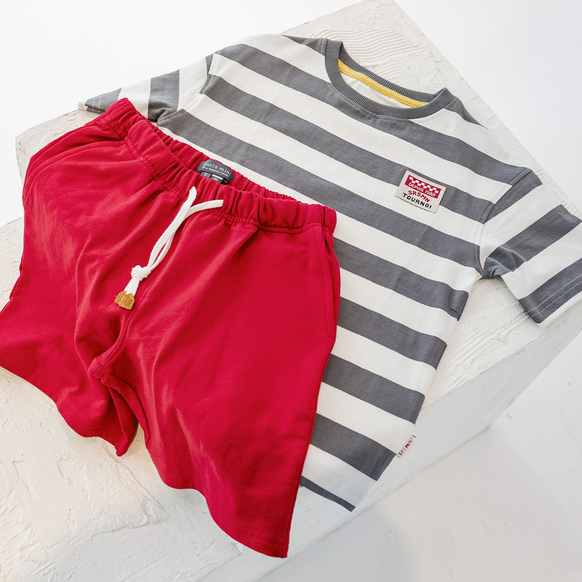 White and gray striped T-shirt, child