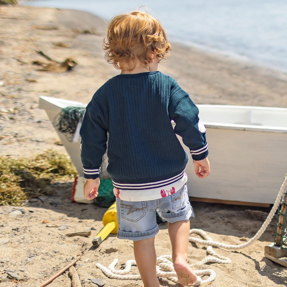 Chandail bleu en tricot avec poissons, bébé