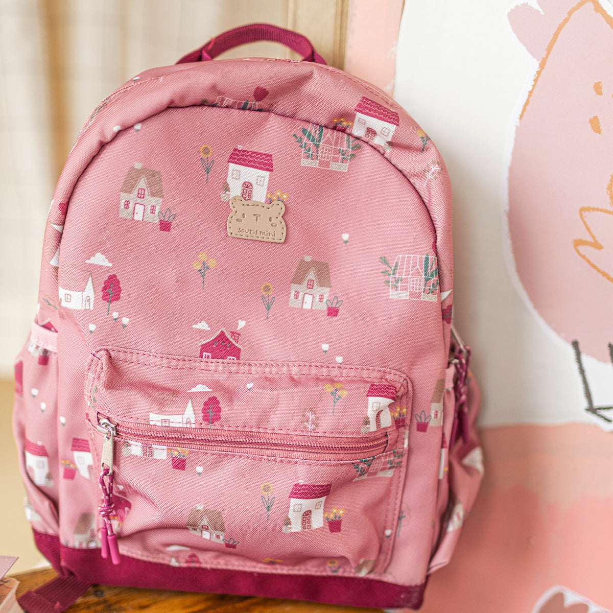 Sac à dos petit format rose à imprimé petites maisons