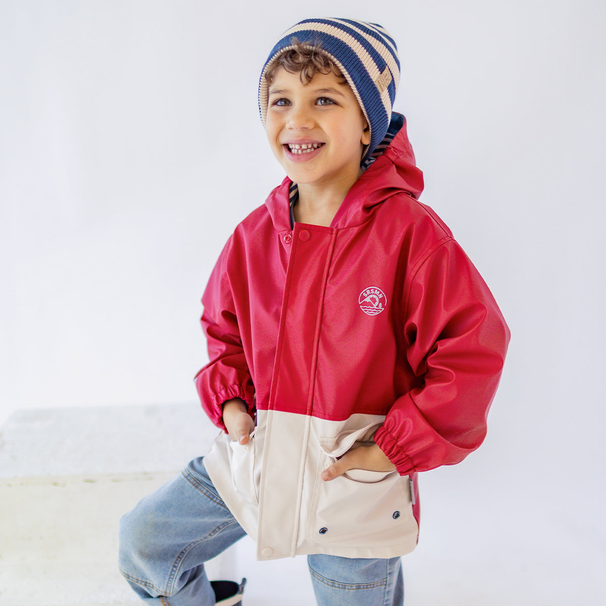 Manteau imperméable rouge et crème, enfant