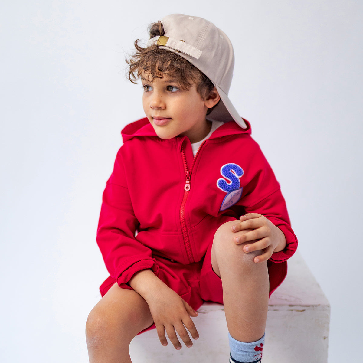Red hooded sweatshirt, child