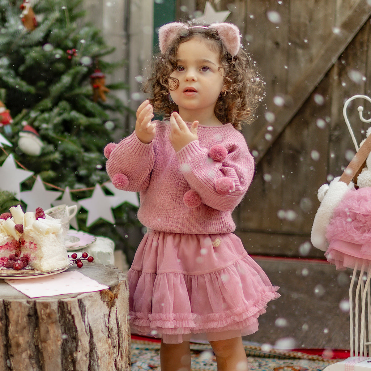 Photo d'un bébé portant la jupe rose en tulle souple, bébé