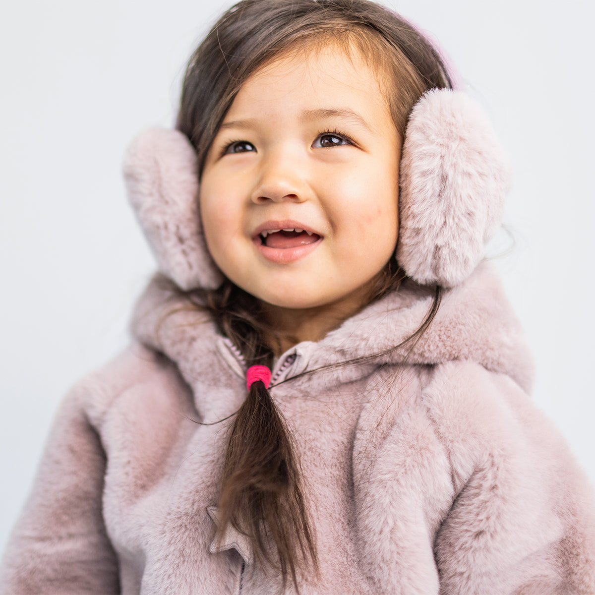 Cache-oreilles rose en fausse fourrure, enfant