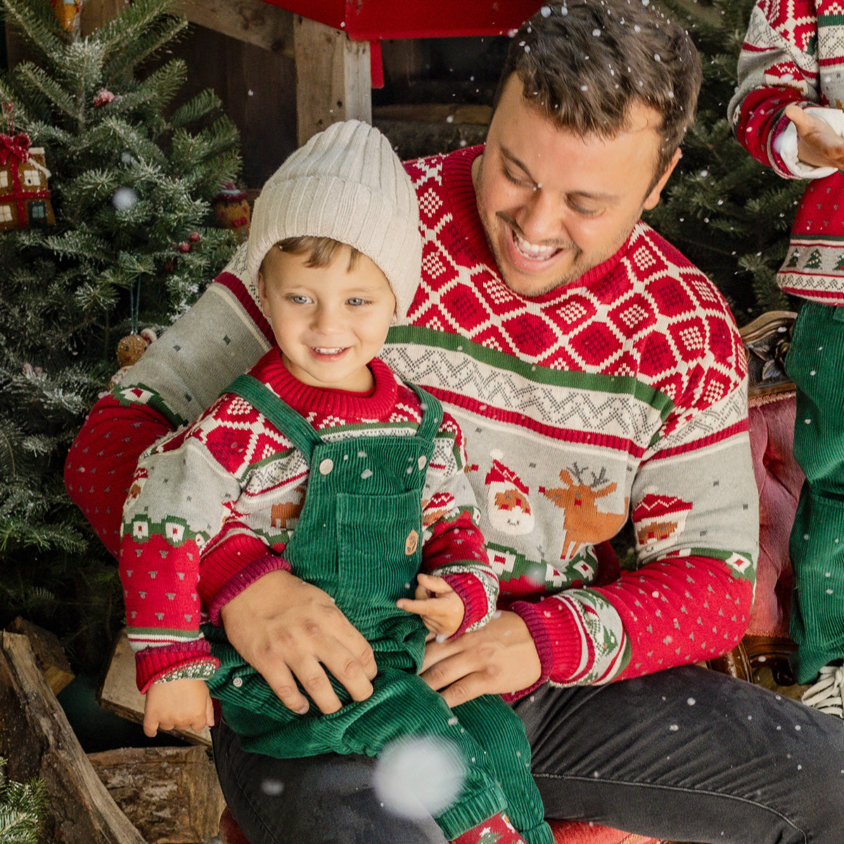 Red knit sweater with festive patterns, adult