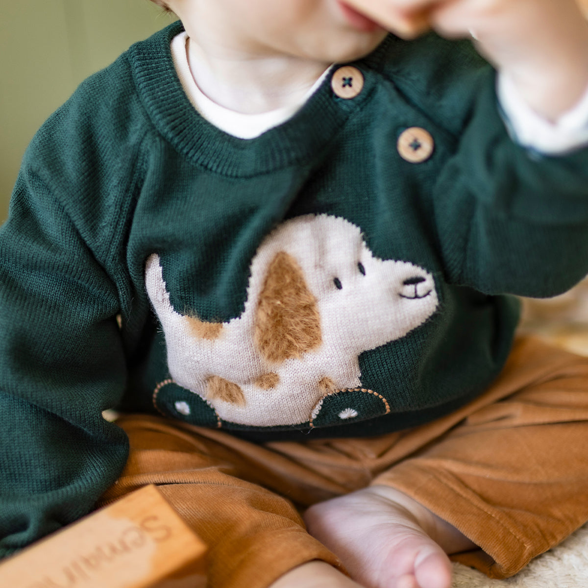 Chandail vert en tricot avec motif jacquard, naissance