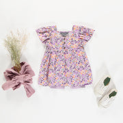 Robe évasée à manches courtes mauve fleurie en viscose, bébé || Purple flowery dress with short sleeves in viscose, baby
