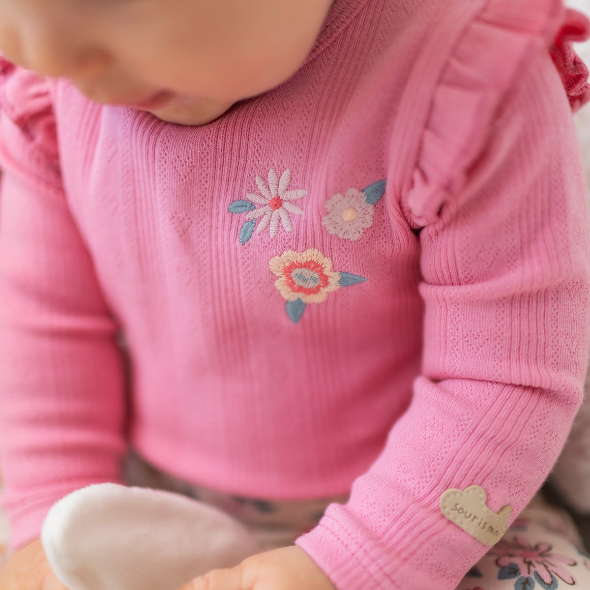Pink embroidered bodysuit, baby