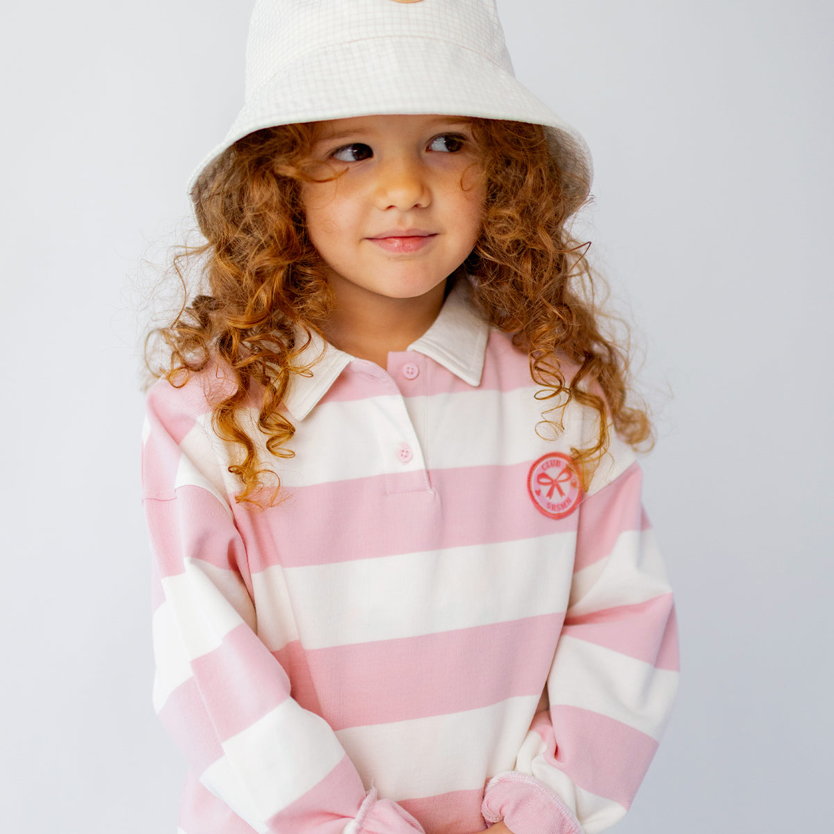 Chandail crème et rose à rayures avec col polo, enfant