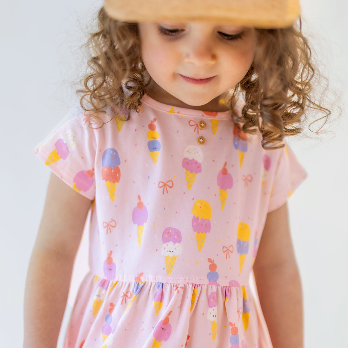 Robe rose à motifs de crèmes glacées, bébé