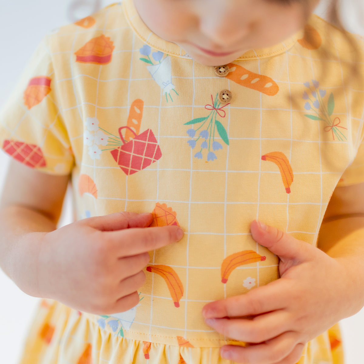 Yellow patterned dress, baby