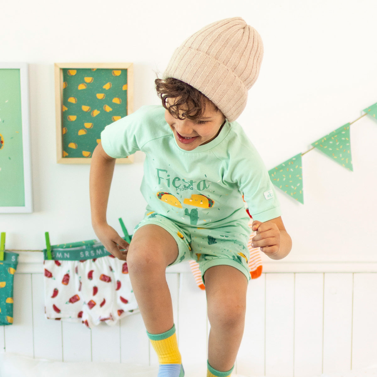 Green two-piece pajama set with fiesta pattern, child