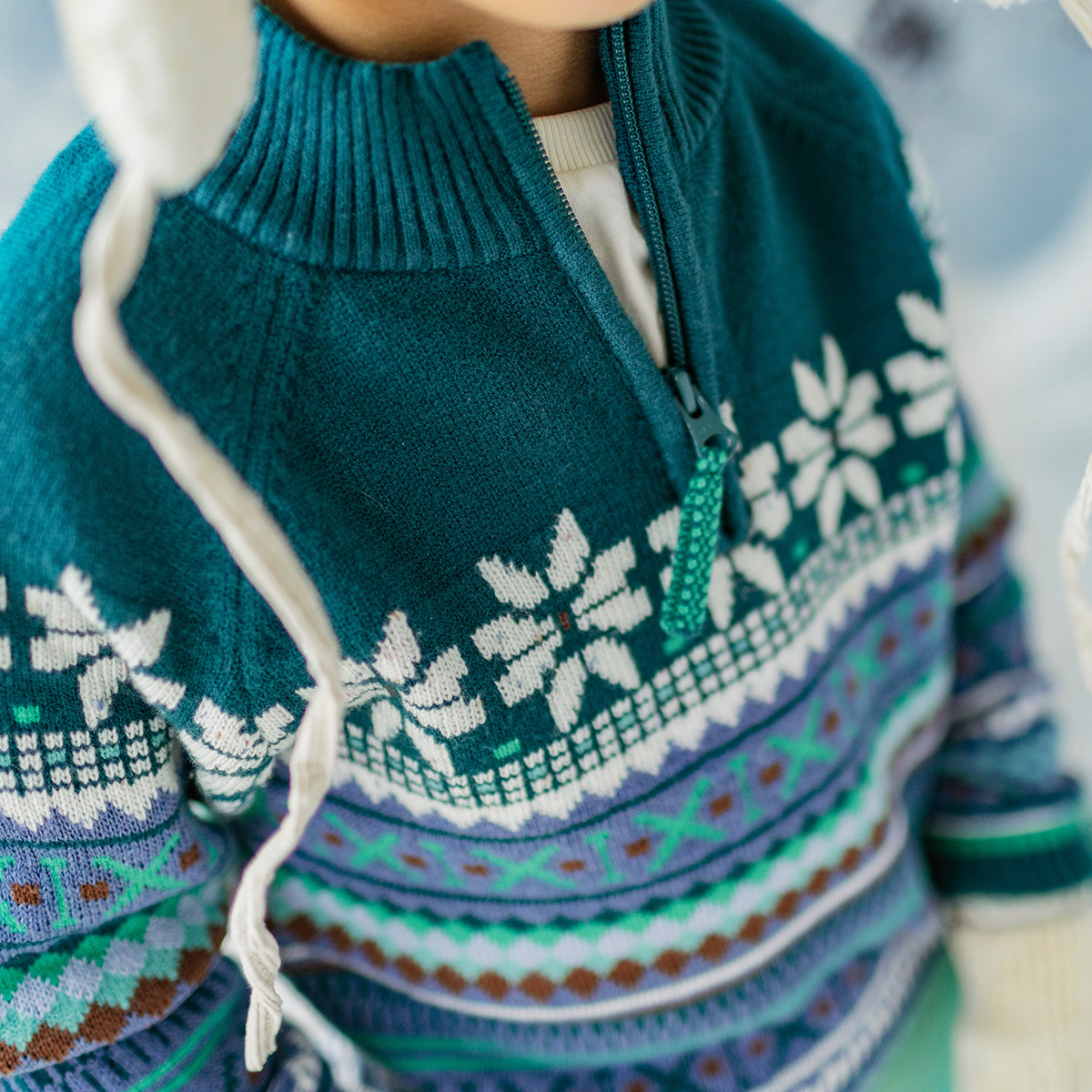 Teal patterned knit sweater, child