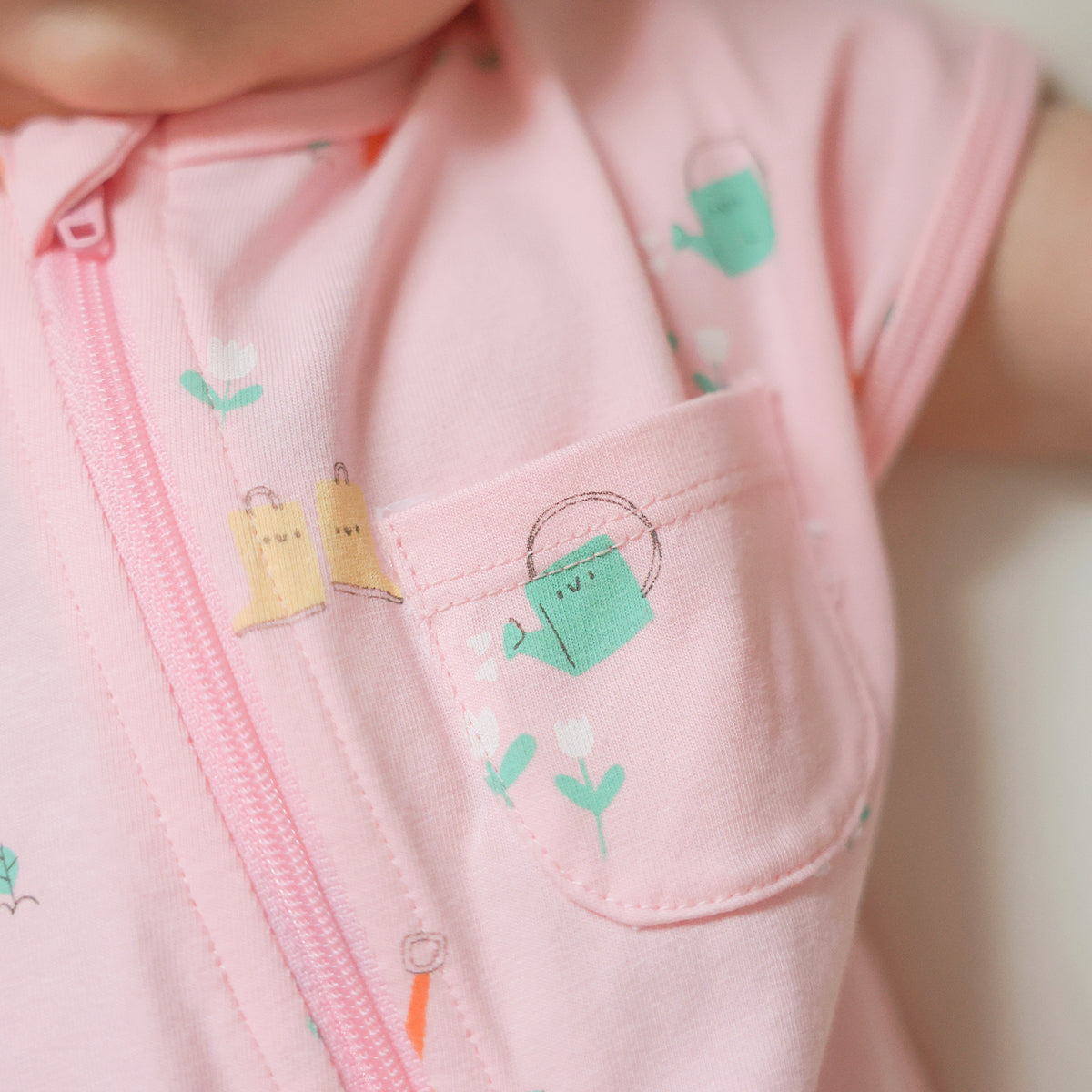 Pink patterned one-piece pajamas, newborn